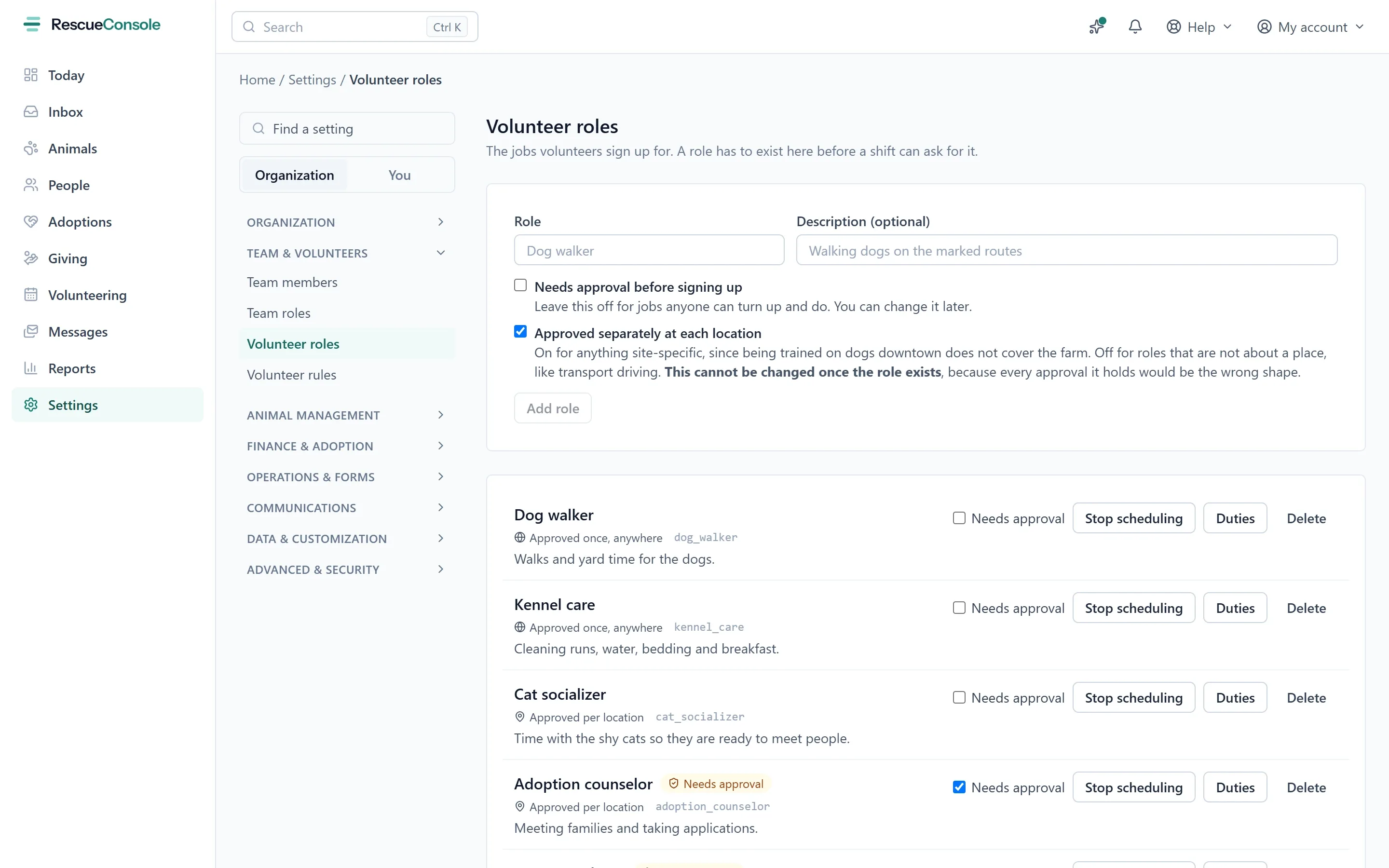 Volunteer roles in Settings: a new role with whether it needs approval and whether it is approved at each location separately, then each role with its approval, Duties and Stop scheduling. Open it larger.